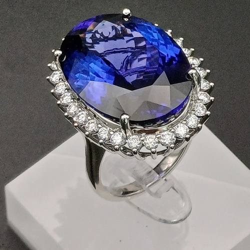 48 - Look at the deep colour of this Tanzanite!  It is no less than 30 ct and then you have beautiful Dia... 