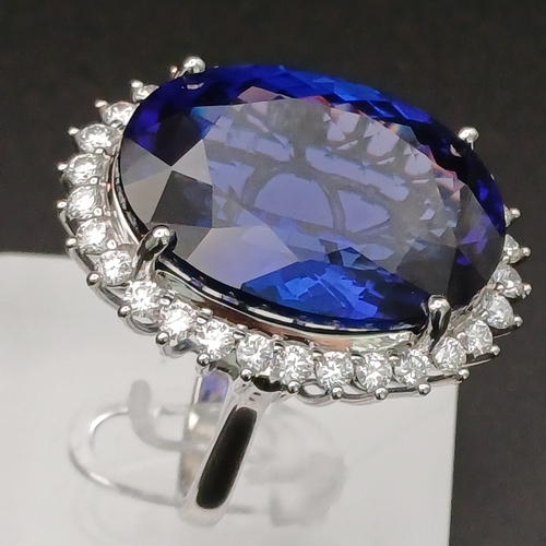 48 - Look at the deep colour of this Tanzanite!  It is no less than 30 ct and then you have beautiful Dia... 