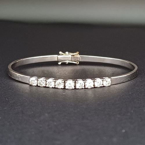 51 - And the sparkle continues with this really lovely Diamond Bangle. 
- 9 x diamonds
- 18 ct white gold... 