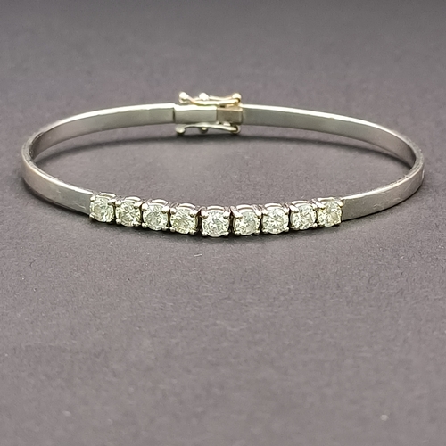 51 - And the sparkle continues with this really lovely Diamond Bangle. 
- 9 x diamonds
- 18 ct white gold... 