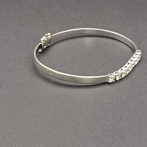 51 - And the sparkle continues with this really lovely Diamond Bangle. 
- 9 x diamonds
- 18 ct white gold... 