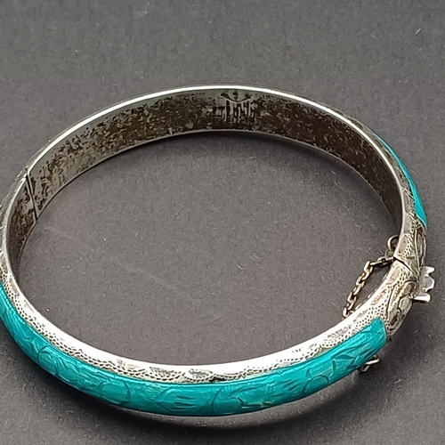 54 - Another really lovely piece Turquoise Enamel Silver Hing Bangle.  
- Silver
- 17.4 g