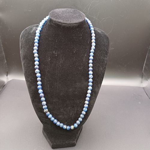 55 - A Natural Blue Stone Beaded Necklace, possibly Lapis Lazuli. They stay lovely and cool just like Jad... 