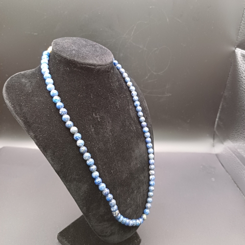 55 - A Natural Blue Stone Beaded Necklace, possibly Lapis Lazuli. They stay lovely and cool just like Jad... 