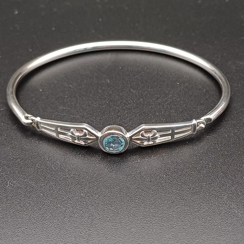 67 - Beautiful Silver Bangle with Blue Stone (possibly Topaz) set in 925 silver weight 8.8 g