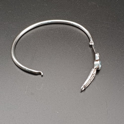 67 - Beautiful Silver Bangle with Blue Stone (possibly Topaz) set in 925 silver weight 8.8 g