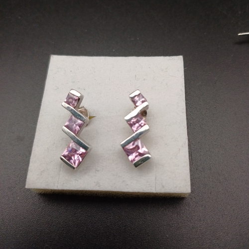 73 - Three pairs of 925 Silver Earrings:
1 x Pink Stone (possibly CZ)
2 x White Stone