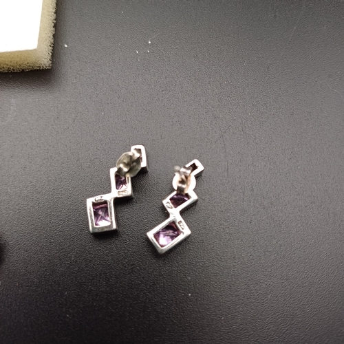 73 - Three pairs of 925 Silver Earrings:
1 x Pink Stone (possibly CZ)
2 x White Stone