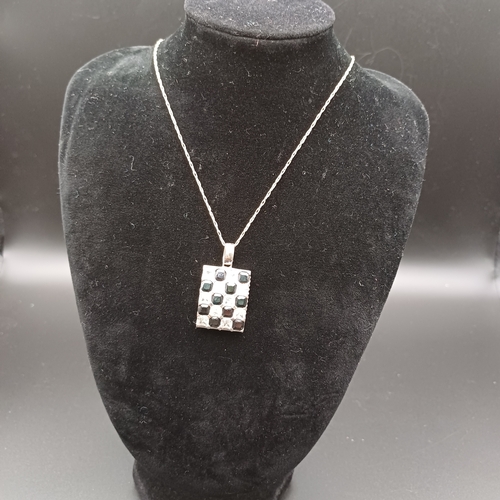 84 - Silver 925 Pendant with Black and White Stone on a chain, but no hallmark on the chain.