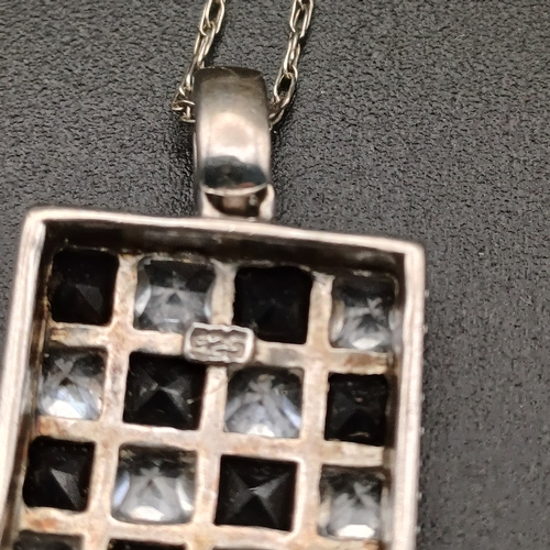 84 - Silver 925 Pendant with Black and White Stone on a chain, but no hallmark on the chain.