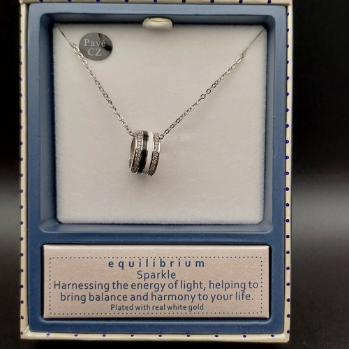 85 - In the original box we have this very pretty Equilibrium White Gold Plated Necklace