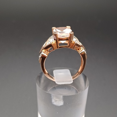 106 - Rose Quartz and Diamond Ring with both brilliant and baguette cut diamonds.  All set in 14 ct Rose G... 