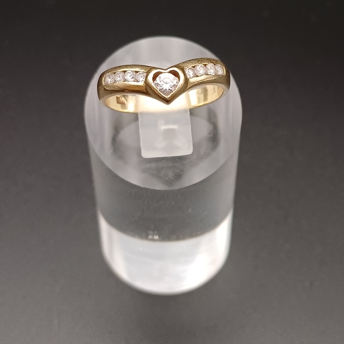 111 - Wish Bone Style Ring with White Stones Set in.
- 14 ct yellow gold
- weight 2.2 g
- size M / N