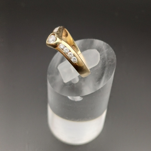 111 - Wish Bone Style Ring with White Stones Set in.
- 14 ct yellow gold
- weight 2.2 g
- size M / N