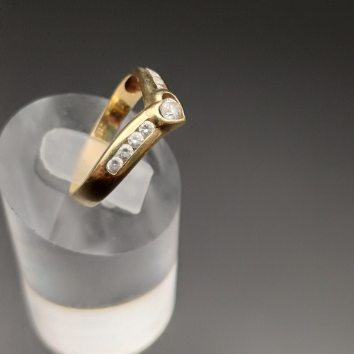 111 - Wish Bone Style Ring with White Stones Set in.
- 14 ct yellow gold
- weight 2.2 g
- size M / N