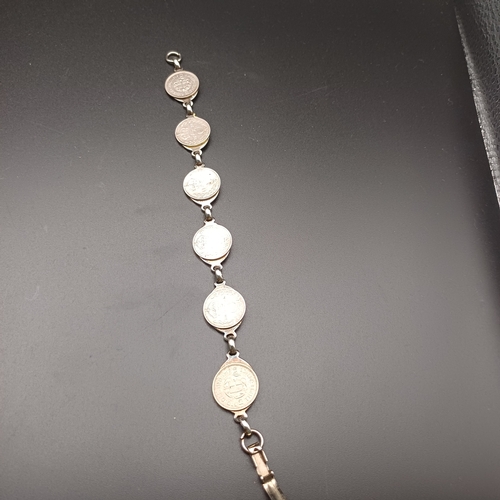 126 - Here we have old Three Pence Coins being converted into a bracelet.  The coins range from 1916 to 19... 