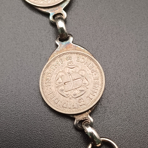 126 - Here we have old Three Pence Coins being converted into a bracelet.  The coins range from 1916 to 19... 
