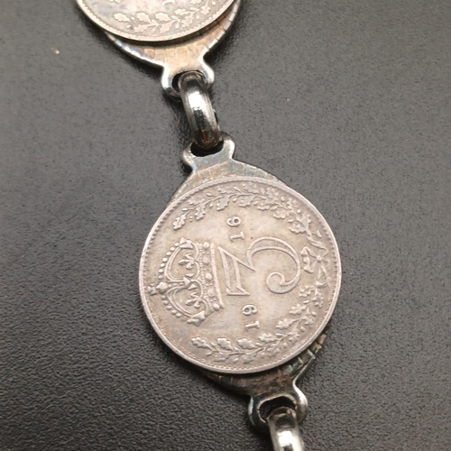 126 - Here we have old Three Pence Coins being converted into a bracelet.  The coins range from 1916 to 19... 