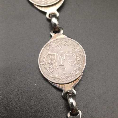 126 - Here we have old Three Pence Coins being converted into a bracelet.  The coins range from 1916 to 19... 