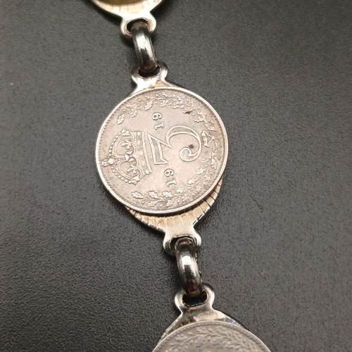 126 - Here we have old Three Pence Coins being converted into a bracelet.  The coins range from 1916 to 19... 
