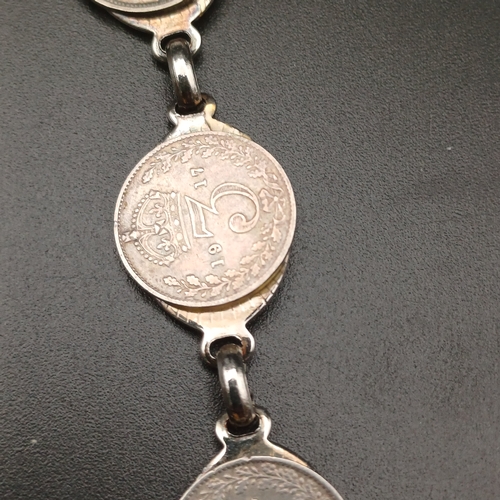 126 - Here we have old Three Pence Coins being converted into a bracelet.  The coins range from 1916 to 19... 