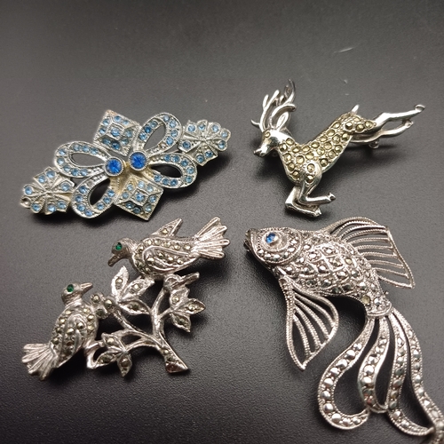 131 - This lot has four Marcasite Brooches:
1 x Two birds facing each other
1 x Fish
1 x Deer
1 x Blue sto... 