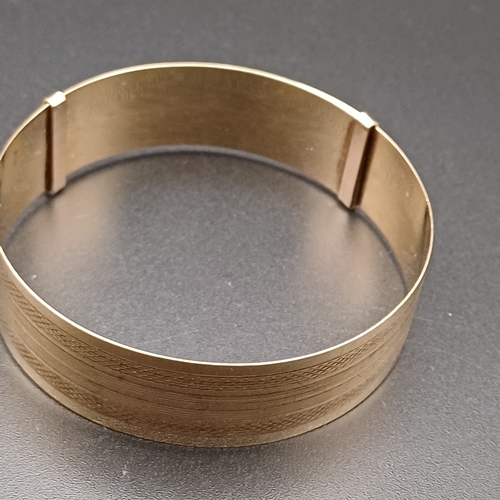 4 - Expanding Gold Plated Wide Bangle with a simple design and the bangle weighs 14.7 g