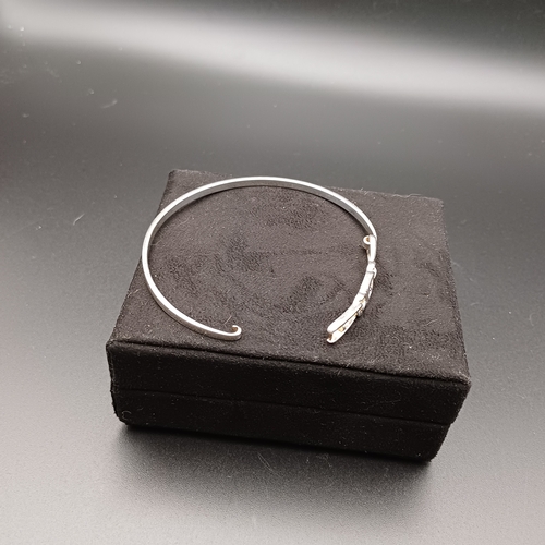 9 - Bangle with White Stone set in in 925 Silver weighing 11.7 g