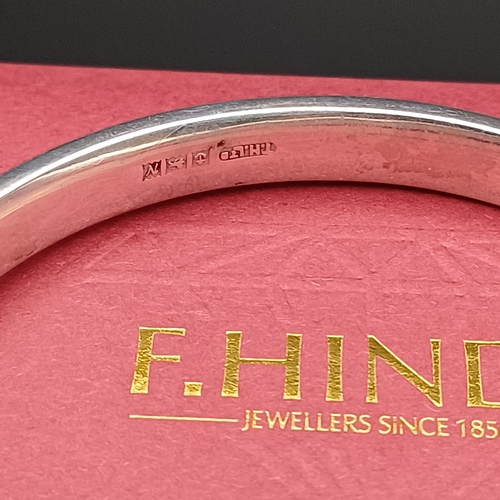 11 - Boxed Silver Hing Bangle with a design on one side.
- 925 silver
- weight 13.1 g