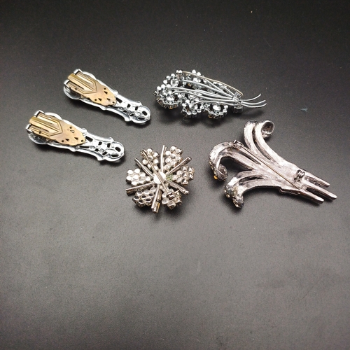 20 - This lot has five items all crystal embellished:
2 x Clips
3 x Brooches