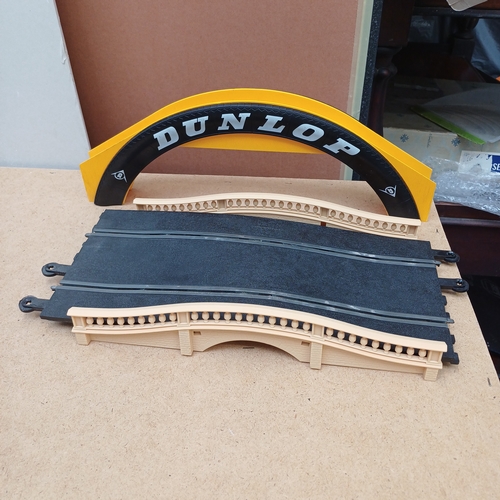 37 - Scalextric Extras in their original boxes:
1 x Hump Back Bridge
1 x Dunlop Bridge