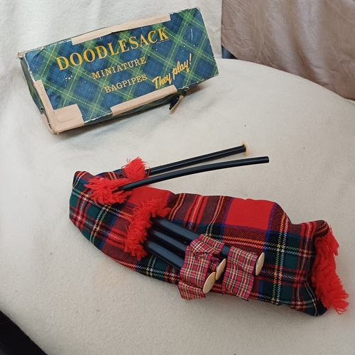 44 - Miniature Bagpipes in their original box and according to the box they are working and playable bagp... 