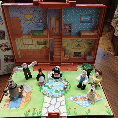 53 - Wallace & Gromit Play House.  This comes in its original box with all the figures.  The figures were... 