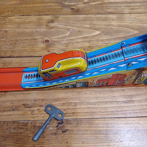 54 - This is such fun and yes we have tested it in the Antiques Room.  It is a Wind-up Coal Train and he ... 