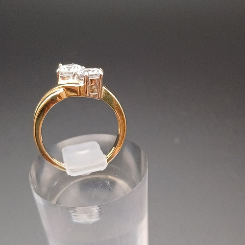 9 - Two Stone CZ Ring set in 
- 9ct gold 
- size J 
- weighing 3.7 g