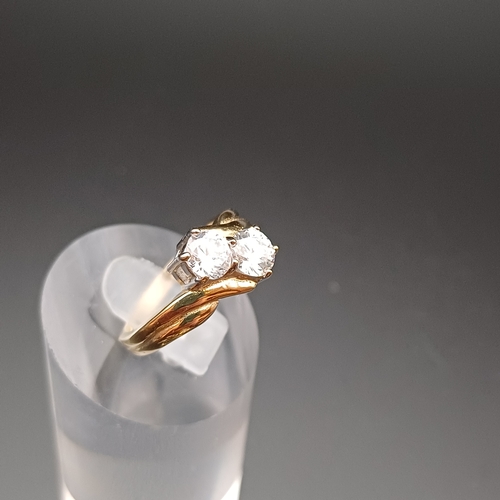 9 - Two Stone CZ Ring set in 
- 9ct gold 
- size J 
- weighing 3.7 g