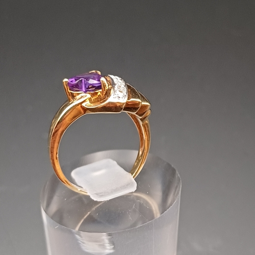 11 - Heart Shaped Amethyst and Diamond Ring in a very pretty shank
- 9 ct
- size J
- weight 3.7 g