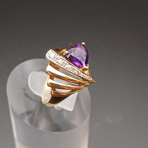 11 - Heart Shaped Amethyst and Diamond Ring in a very pretty shank
- 9 ct
- size J
- weight 3.7 g