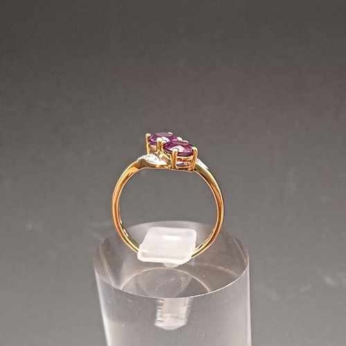 28 - Two Stone Amethyst and Diamond Ring in a very pretty setting.
- size J/ K
- weight 1.5 g
- 9 ct