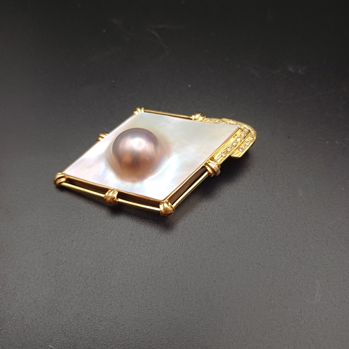 32 - Stunning Mother of Pearl and Diamond Pendant, with a Pearl actually capsulated.
- 14 ct
- weight 16.... 