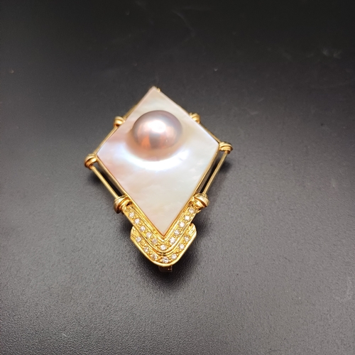 32 - Stunning Mother of Pearl and Diamond Pendant, with a Pearl actually capsulated.
- 14 ct
- weight 16.... 