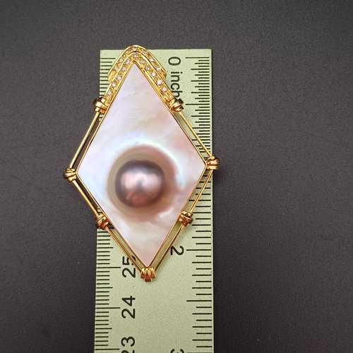 32 - Stunning Mother of Pearl and Diamond Pendant, with a Pearl actually capsulated.
- 14 ct
- weight 16.... 