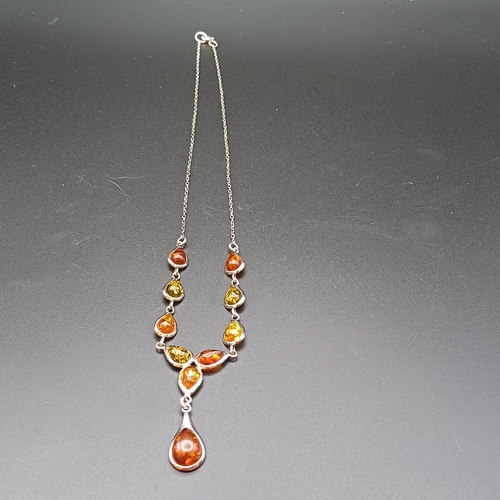 33 - Stunning Multicolour Amber Necklace set in 925 Silver.  The colours of the Amber are very intense.  ... 