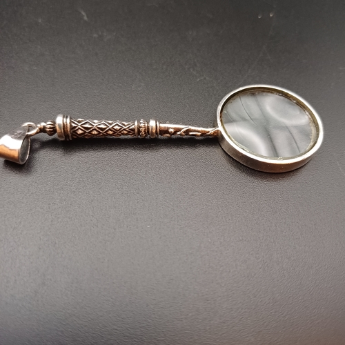 38 - Magnifying Glass Pendant set in 925 Silver with very pretty design down the handle.  This is a reall... 