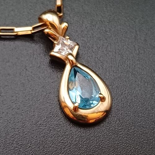 39 - Really pretty 18 inch 9 ct Gold Chain with two pendants:
1 x Pendant with a Blue Stone (Topaz or Sap... 