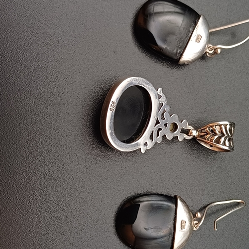 42 - Earring and Pendant set.  Black Stone/Onyx.  Really pretty.
- 925 silver