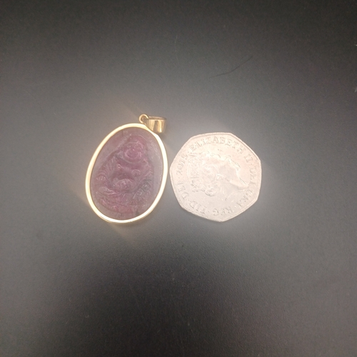 43 - Natural Carved Ruby Cameo set in 9 ct gold weighing 7.9 g