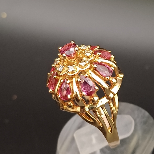 57 - Ruby and Diamond Raised Cluster Ring really eye catching.
- size O
- 14 ct
- weight 7.5 g