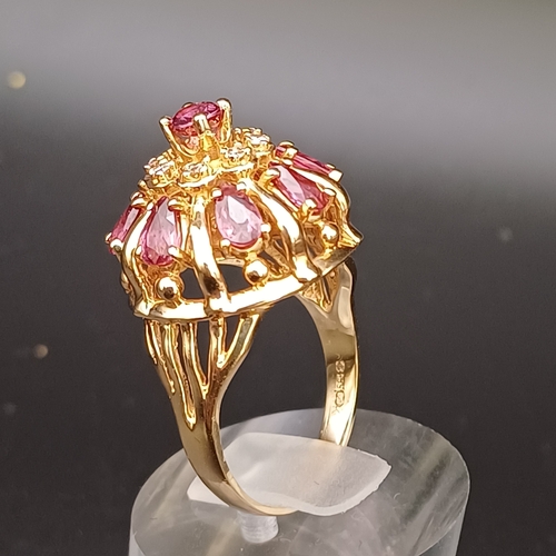 57 - Ruby and Diamond Raised Cluster Ring really eye catching.
- size O
- 14 ct
- weight 7.5 g