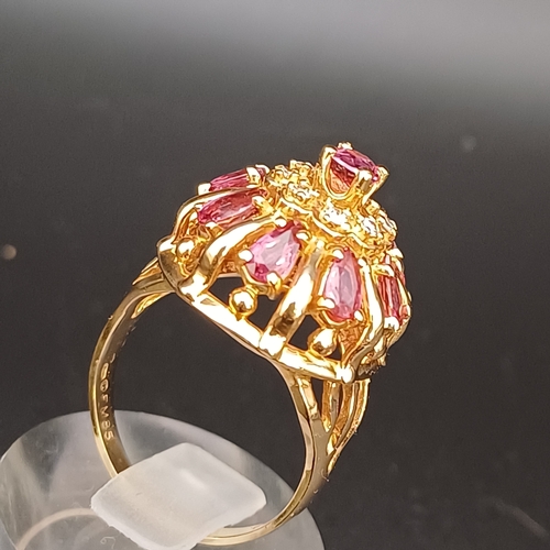 57 - Ruby and Diamond Raised Cluster Ring really eye catching.
- size O
- 14 ct
- weight 7.5 g